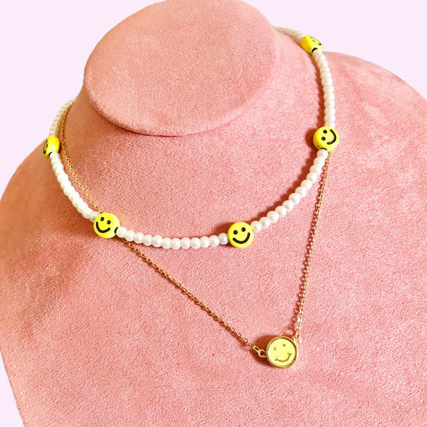 Collar happy face acero.